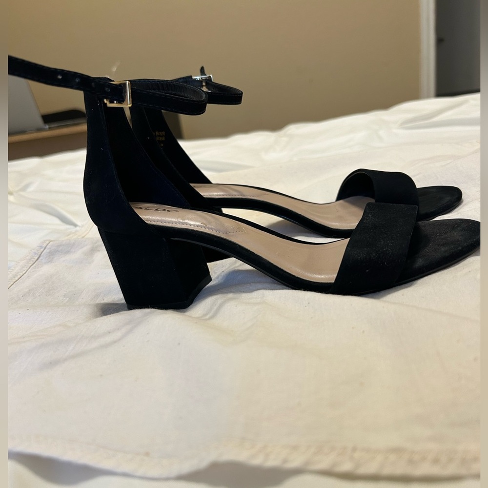 Aldo Black Ankle Strap Heels 
Only worn once, 6.5 shoes,  about 3 inch heel